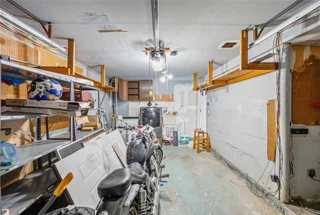 11 Trescott St, Dix Hills, NY 11746 - garage featuring washer and clothes dryer