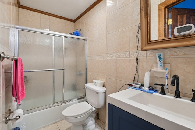 9406 76th St, Ozone Park, NY 11416 - bathroom with tile walls, crown molding, bath / shower combo with glass door, vanity, and tasteful backsplash