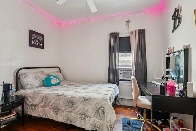 9406 76th St, Ozone Park, NY 11416 - bedroom with wood finished floors, cooling unit, and a ceiling fan