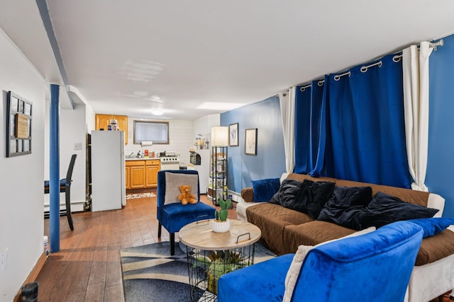 9406 76th St, Ozone Park, NY 11416 - living room featuring dark wood-style floors and baseboard heating