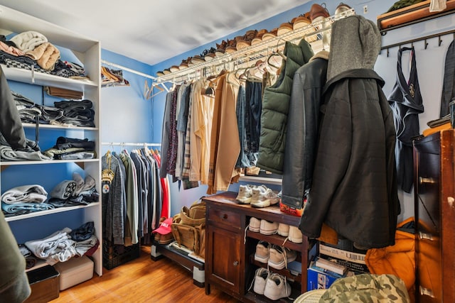9406 76th St, Ozone Park, NY 11416 - spacious closet featuring wood finished floors