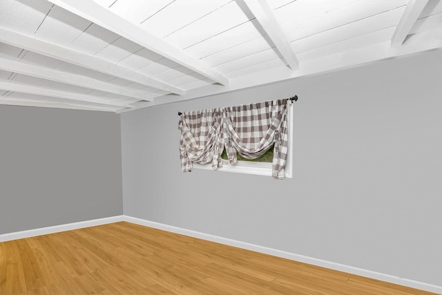 101 Alice St, Port Jefferson, NY 11777 - unfurnished room featuring beamed ceiling and light wood-type flooring