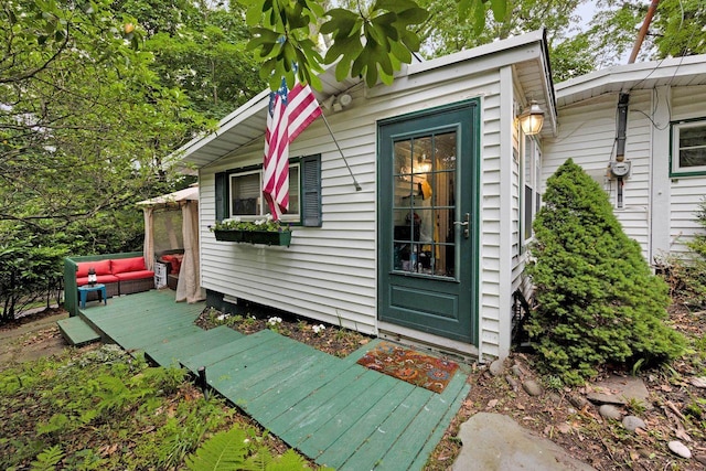 101 Alice St, Port Jefferson, NY 11777 - entrance to property with an outdoor living space