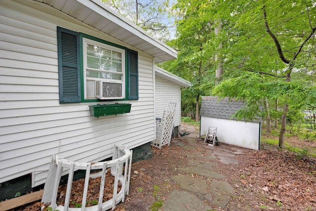 101 Alice St, Port Jefferson, NY 11777 - view of property exterior featuring a storage shed