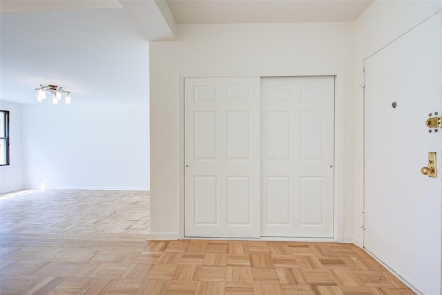 98-22 63rd Dr Unit 1D, Rego Park, NY 11374 - unfurnished bedroom with a closet and baseboards