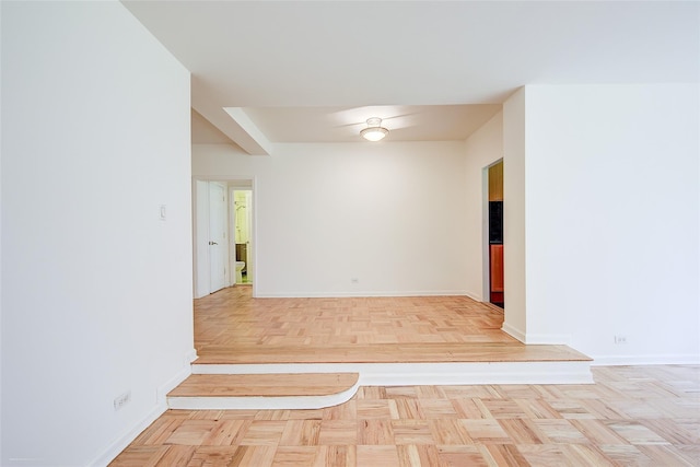 98-22 63rd Dr Unit 1D, Rego Park, NY 11374 - spare room with baseboards