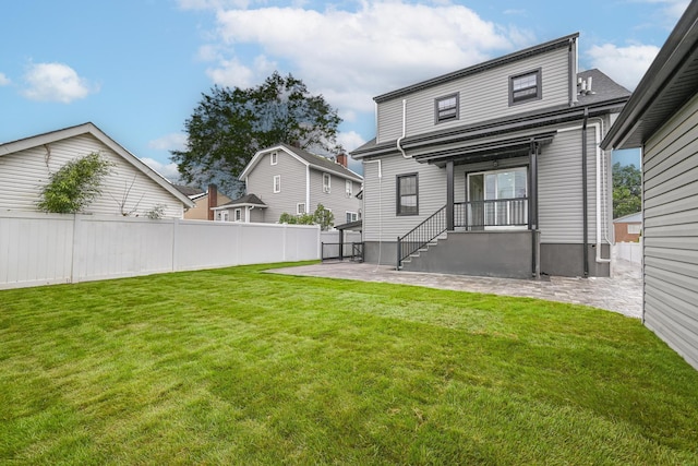 108 Bismark Ave, Valley Stream, NY 11581 - back of house featuring a patio