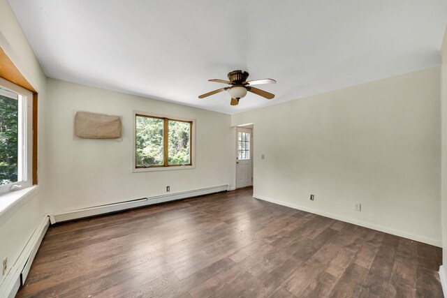 107 Cedar Ln, Medford, NY 11763 - empty room with ceiling fan, a baseboard radiator, and dark wood finished floors
