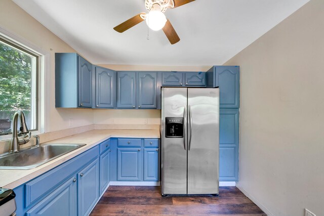 107 Cedar Ln, Medford, NY 11763 - kitchen featuring stainless steel fridge with ice dispenser and blue cabinets