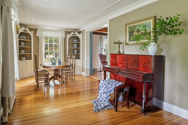 797 Western Rd, Call Listing Agent, NY 12033 - dining room featuring hardwood / wood-style floors and built in features