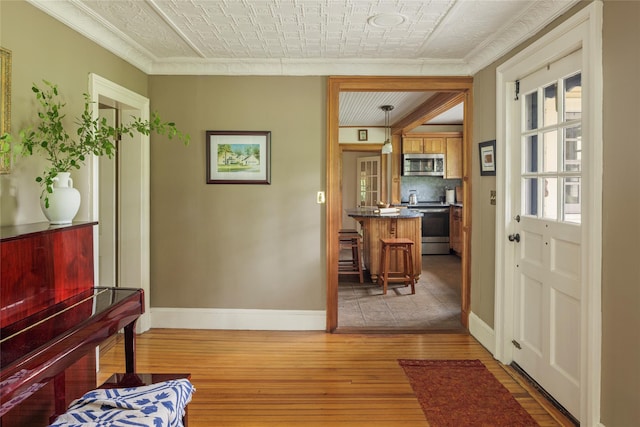 797 Western Rd, Call Listing Agent, NY 12033 - entrance foyer featuring light wood-type flooring, crown molding, and an ornate ceiling