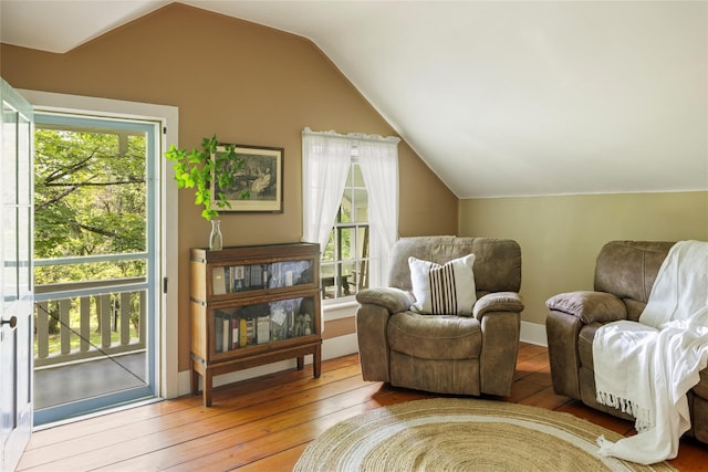797 Western Rd, Call Listing Agent, NY 12033 - living area featuring lofted ceiling, plenty of natural light, and hardwood / wood-style floors