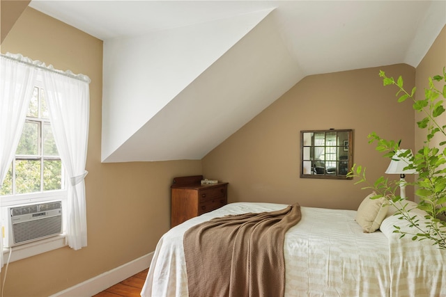 797 Western Rd, Call Listing Agent, NY 12033 - bedroom with wood finished floors and lofted ceiling