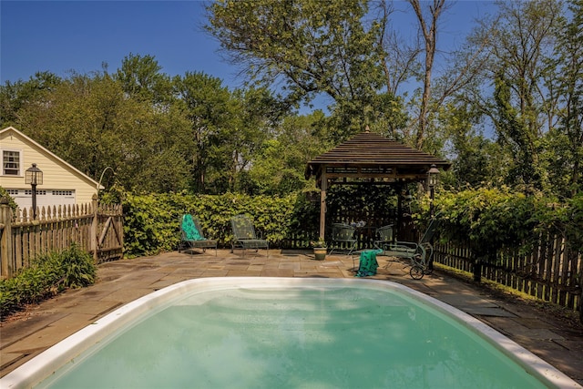 797 Western Rd, Call Listing Agent, NY 12033 - view of pool featuring a patio, a fenced backyard, and a gazebo