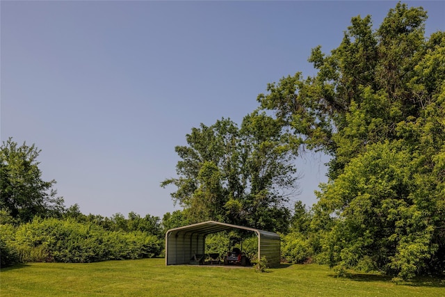 797 Western Rd, Call Listing Agent, NY 12033 - view of green lawn with a detached carport