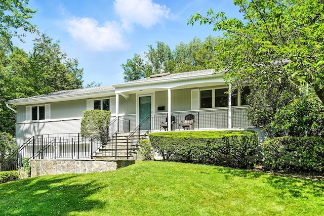 65 Shepherds Dr, Scarsdale, NY 10583 - ranch-style house with a front lawn, a porch, and stairway
