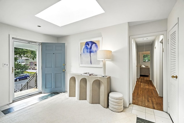 65 Shepherds Dr, Scarsdale, NY 10583 - entryway with plenty of natural light, tile patterned floors, and a skylight