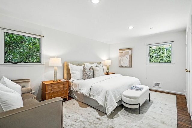 65 Shepherds Dr, Scarsdale, NY 10583 - bedroom with multiple windows, wood finished floors, and recessed lighting