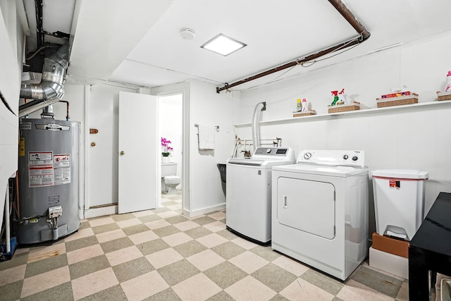 65 Shepherds Dr, Scarsdale, NY 10583 - laundry room with gas water heater, independent washer and dryer, and light floors