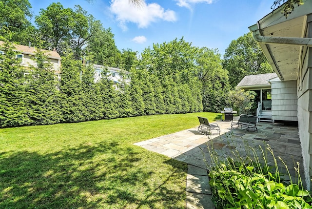 65 Shepherds Dr, Scarsdale, NY 10583 - view of grassy yard featuring a patio area