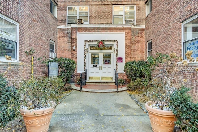 71--36 110th St Unit 1/L, Forest Hills, NY 11375 - doorway to property featuring brick siding