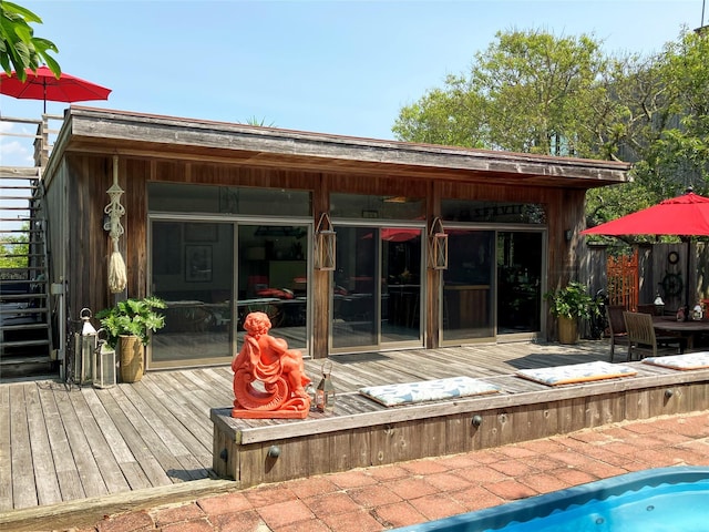 457 Fire Island Blvd, Fire Island Pines, NY 11782 - back of property with a deck