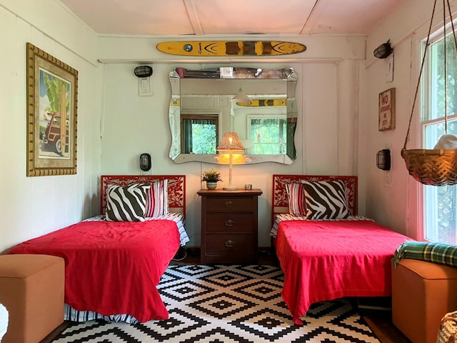 457 Fire Island Blvd, Fire Island Pines, NY 11782 - bedroom featuring multiple windows and attic access