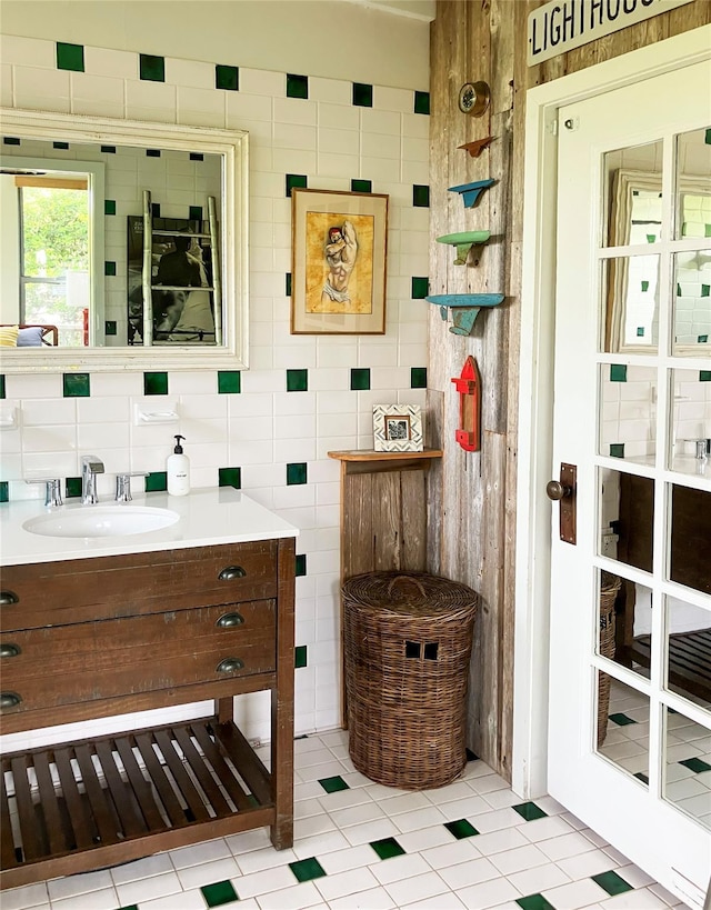 457 Fire Island Blvd, Fire Island Pines, NY 11782 - bathroom featuring vanity, tile patterned floors, and tile walls