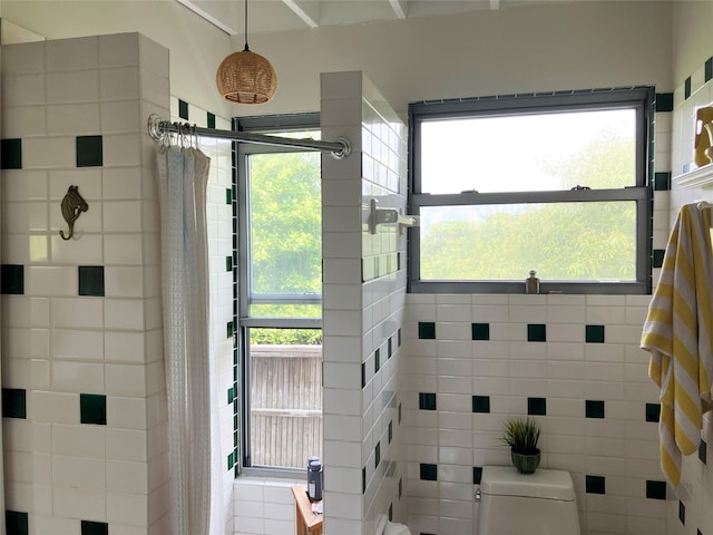 457 Fire Island Blvd, Fire Island Pines, NY 11782 - bathroom featuring tiled shower and plenty of natural light