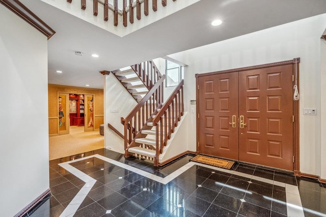 43 Hunt Dr, Jericho, NY 11753 - foyer featuring granite floors, recessed lighting, and stairs