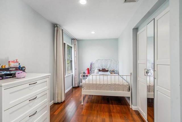 43 Hunt Dr, Jericho, NY 11753 - bedroom with dark wood-type flooring and recessed lighting