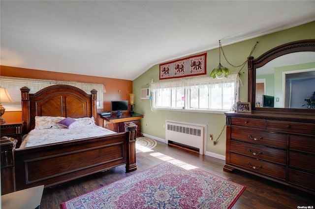 20 Basket Ln, Hicksville, NY 11801 - bedroom with radiator, vaulted ceiling, a wall mounted air conditioner, and dark wood-type flooring