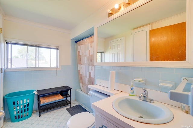 20 Basket Ln, Hicksville, NY 11801 - bathroom with tile walls, vanity, plenty of natural light, ornamental molding, and shower / tub combo
