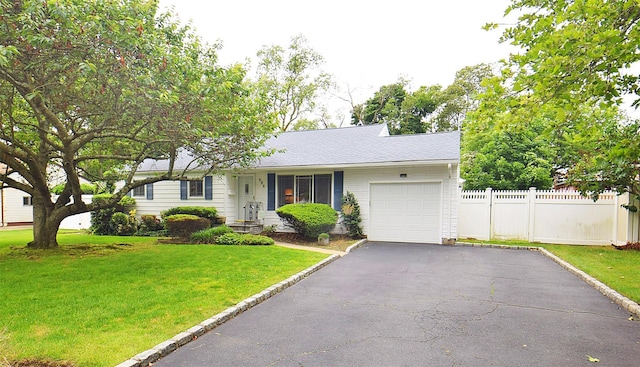 986 Gardiner Dr, Bay Shore, NY 11706 - ranch-style home with a garage and asphalt driveway