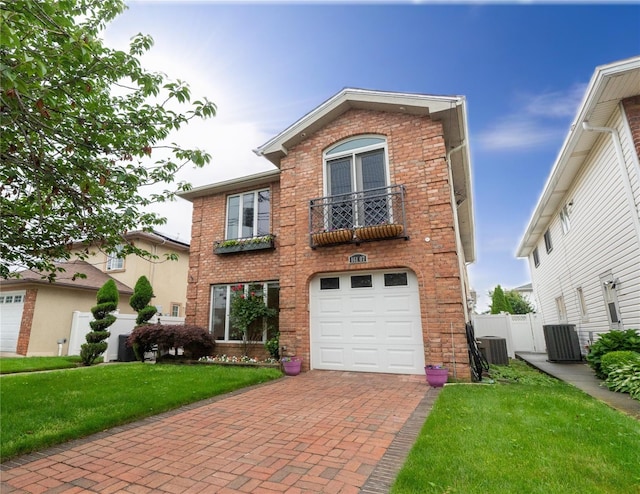 16107 90th St, Howard Beach, NY 11414 - view of front of home with brick siding, decorative driveway, a garage, and a balcony