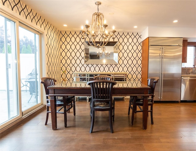 16107 90th St, Howard Beach, NY 11414 - dining space with a chandelier, plenty of natural light, wood finished floors, and recessed lighting