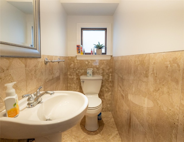 16107 90th St, Howard Beach, NY 11414 - bathroom with tile walls and wainscoting