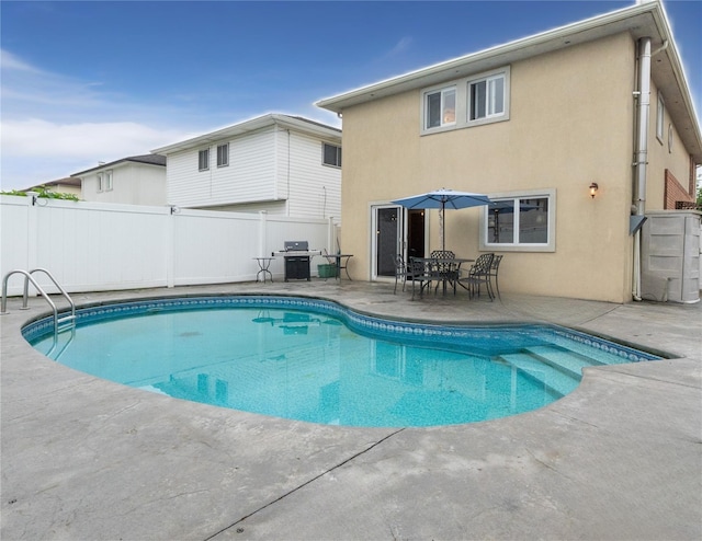 16107 90th St, Howard Beach, NY 11414 - view of swimming pool featuring a patio and a grill