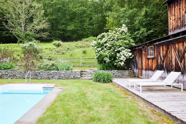 54 Davis Ln, Grahamsville, NY 12740 - view of yard with an outdoor pool, a wooden deck, and a forest view