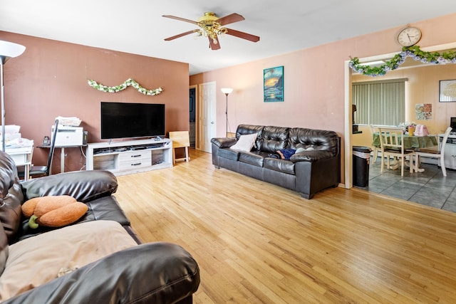 18 Happy Acres Dr, Shirley, NY 11967 - living area with wood finished floors and ceiling fan