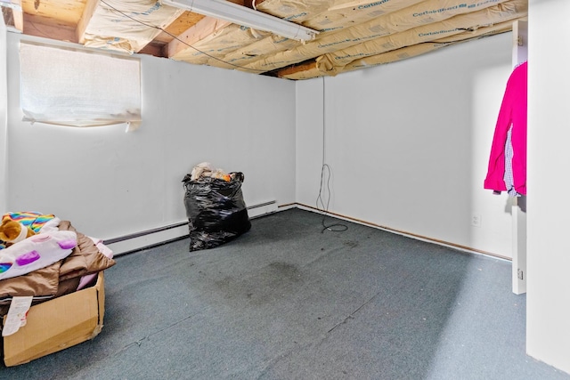 18 Happy Acres Dr, Shirley, NY 11967 - below grade area featuring a baseboard radiator