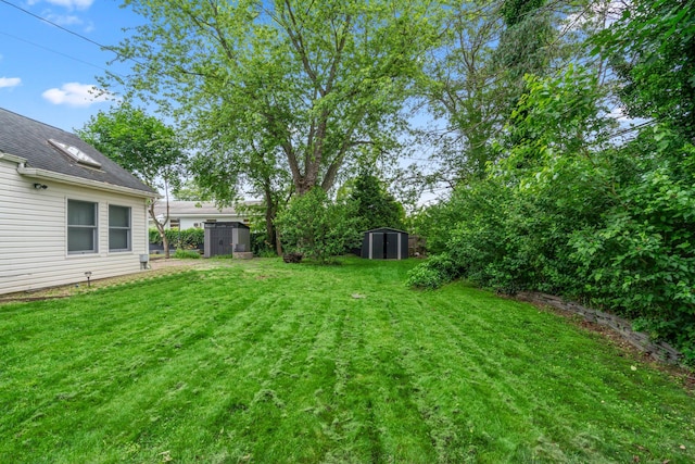 2 Fernwood Dr, Commack, NY 11725 - view of grassy yard featuring a storage shed