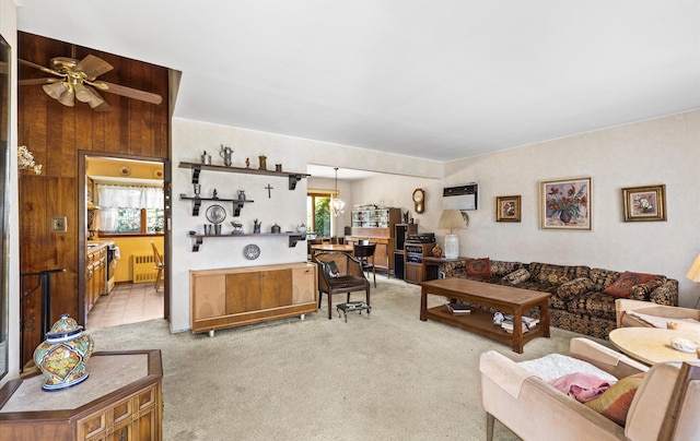 15 Lane Ave, Plainview, NY 11803 - living area with light colored carpet, radiator, and a ceiling fan
