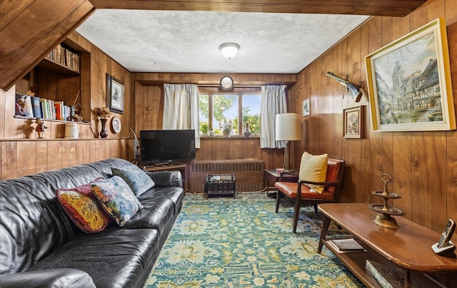 15 Lane Ave, Plainview, NY 11803 - living area featuring wood walls, carpet flooring, and a textured ceiling
