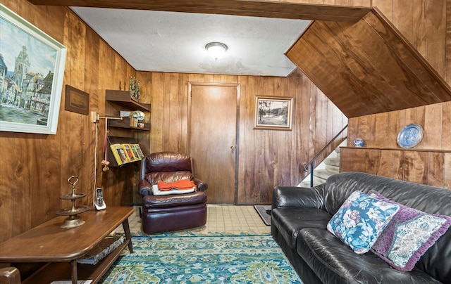 15 Lane Ave, Plainview, NY 11803 - living room featuring wood walls and stairway