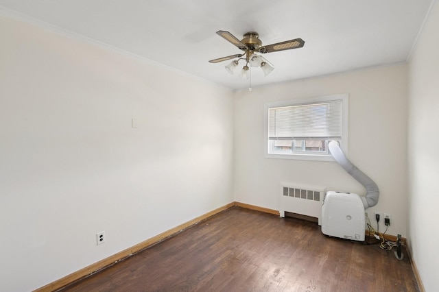 19 Evelyn Rd, Plainview, NY 11803 - empty room featuring radiator heating unit, wood finished floors, a ceiling fan, and ornamental molding