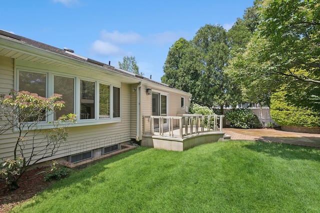 19 Evelyn Rd, Plainview, NY 11803 - view of property exterior with a deck and a lawn