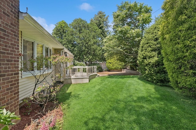 19 Evelyn Rd, Plainview, NY 11803 - view of grassy yard featuring a wooden deck