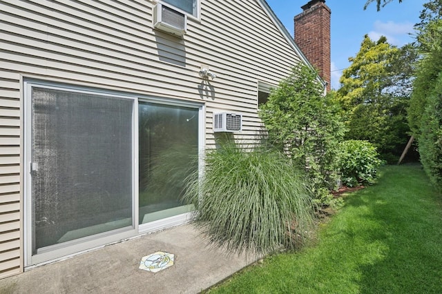 19 Evelyn Rd, Plainview, NY 11803 - view of property exterior featuring a yard, a chimney, and a wall mounted air conditioner