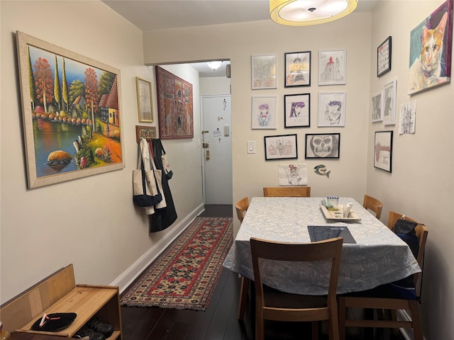 33-27 91st St Unit 5F, Jackson Heights, NY 11372 - dining area featuring wood finished floors and baseboards